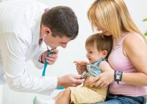 eei.edu-doctor examining kid patient with stethoscope