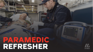 Paramedic treating patient in ambulance.